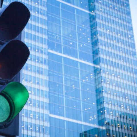 Implementing Stochastic Models for Intersections with Regulated Traffic